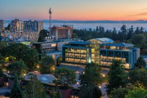 Aerial view of Koerner Library and Vancouver Island at sunset